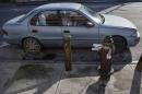 An automobile sits illegally parked without a parking ticket issued by the NYPD in the Queens borough of New York
