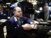 Brian Bartsch works on last minute trades on the floor of the New York Stock Exchange, just before the closing bell