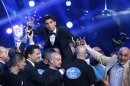 Palestinian singer Assaf reacts after being announced winner of the Season 2 finale of "Arab Idol" in Beirut