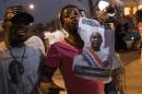 People celebrate the inauguration of Gambia's new President Adama Barrow at Westfield neighbourhood on January 19, 2017 in Banjul