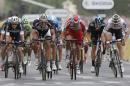 Germany's Marcel Kittel, second left, races to the finish line to win the twenty-first and last stage of the Tour de France cycling race over 137.5 kilometers (85.4 miles) with start in Evry and finish in Paris, France, Sunday, July 27, 2014. (AP Photo/Christophe Ena)