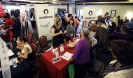 <p> In this Wednesday, Aug. 14, 2013 photo, job seekers check out companies offering more than 2,000 job opportunities at a job fair in Miami Lakes, Fla. The number of people seeking U.S. unemployment benefits rose 13,000 the week of Aug. 12, to a seasonally adjusted 336,000, but the level remains consistent with solid job gains, according to information released by the Labor Department, Thursday, Aug. 22, 2013. (AP Photo/Alan Diaz)