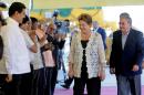 Handout picture released by Cuban official website www.cubadebate.cu showing Cuban President Raul Castro (R) and Brazilian President Dilma Rousseff, arrive for the inauguration of the Mariel "megaport" in Artemisa Province, Cuba