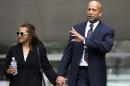 FILE - In this July 9, 2014 file photo, former New Orleans Mayor Ray Nagin leaves federal court with his wife, Seletha Nagin, after being sentenced in New Orleans. Nagin was sentenced to 10 years in prison for bribery, money laundering and other corruption that spanned his two terms as mayor, including the chaotic years after Hurricane Katrina hit in 2005. (AP Photo/Gerald Herbert)