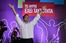 Syriza leader Alexis Tsipras greets his supporters during the party's main pre-election rally in central Athens on September 18, 2015