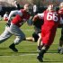 San Francisco 49ers tackle Joe Staley, guard Joe Looney, and guard Al Netter work on blocking drills during a NFL Super Bowl XLVII football practice in New Orleans