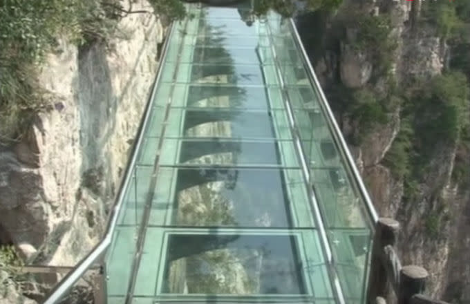 Glass-Bottom Bridge Built On Side of Cliff Cracks, Tourists Terrified