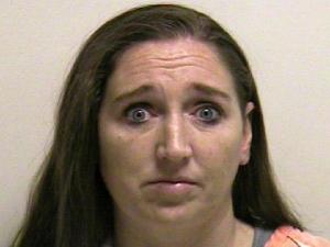 This photo provided by the Utah County jail shows Megan Huntsman, who was booked into the Utah County jail on suspicion of killing six of her newborn children over the past decade. Seven dead babies were found in a garage at a Pleasant Grove home where Huntsman lived up until 2011. (AP Photo/Utah County Jail) Courtesy Utah County Jail