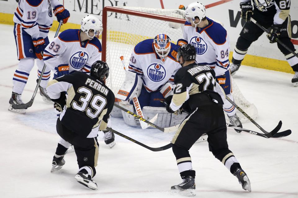Late goals help Penguins escape Oilers 6-4