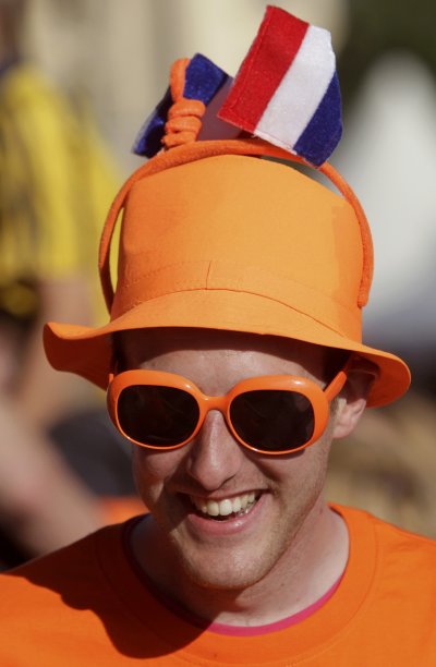 Netherlands' team fan smiles as he relaxes at the Euro 2012 fan zone in Kharkiv