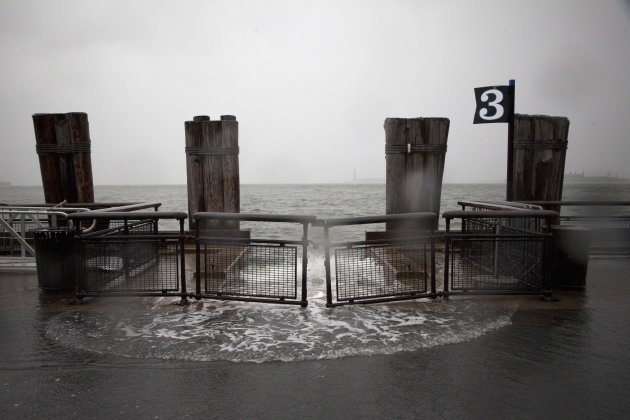 Rising waters break the banks at Battery Park as Hurricane Sandy makes its approach in New York