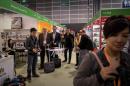 An exhibitor flies a drone at the 40th Toys and Games Fair in Hong Kong, on January 8, 2014