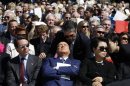 Former Italian Prime Minister Silvio Berlusconi is pictured as a translator repeats remarks by former U.S. president George W. Bush at the dedication ceremony of the George W. Bush Presidential Center in Dallas