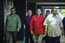 Commanders of the FARC-EP leftist guerrillas (L-R) Ivan Marquez, Rodrigo Granda, Pastor Alape and Pablo Catatumbo arrive at the Convention Palace in Havana, on November 18, 2014