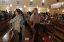 Iraqi Christians attend a mass at St. Joseph Chaldean Church in Baghdad
