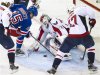 Washington Capitals Holtby stops shot by New York Rangers Dorsett in NHL game in New York