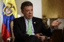 Colombian President Juan Manuel Santos talks to The Associated Press, Tuesday, Sept. 23, 2014, in New York. (AP Photo/Julio Cortez)