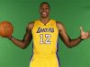 New center Dwight Howard poses for photos during NBA media day for the Los Angeles Lakers basketball team in Los Angeles