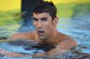 File of Michael Phelps reacting after placing seventh in the 100m freestyle in the 2014 USA National Championships in Irvine, California