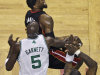 Boston Celtics forwards Kevin Garnett (5) and Mikael Pietrus try to stop Miami Heat forward LeBron James (6) on a drive to the basket during the first quarter of Game 3 in the NBA basketball playoffs Eastern Conference finals, in Boston on Friday, June 1, 2012. (AP Photo/Charles Krupa)