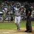 Los Angeles Dodgers' Matt Kemp reacts as he crosses the plate after hitting a home run during the sixth inning of a baseball game against the Milwaukee Brewers Monday, May 20, 2013, in Milwaukee. (AP Photo/Morry Gash)