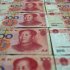 Picture illustration shows Chinese 100 yuan banknotes in Beijing