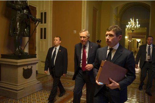Senate Majority Leader Reid walks to his office at the U.S. Capitol in Washington
