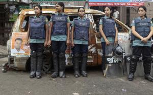 Bangladeshi riot policewomen stand guard in   front of …