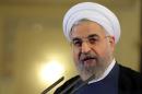 President Hassan Rouhani, pictured here in Tehran on April 3, 2015 had been due to hold talks in Rome on Saturday with Pope Francis as well as Italian counterpart Sergio Mattarella and Prime Minister Matteo Renzi before travelling to the French capital