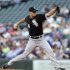 Chicago White Sox starting pitcher Jake Peavy throws against the Seattle Mariners in the first inning of a baseball game Tuesday, June 4, 2013, in Seattle. (AP Photo/Elaine Thompson)