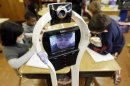 Photos: Student with life-threatening illness attends school via robot