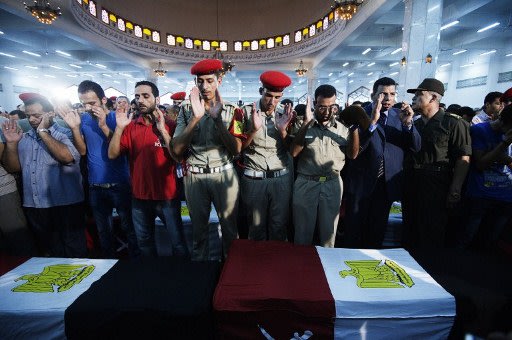 صور/ تغطية أخبارية /جنازة العسكريين المصريين 000-ARP3273497-jpg_062125
