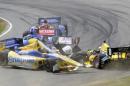 Marco Andretti (25) collides with Tony Kanaan (10), of Brazil, in a first lap crash during the IndyCar Honda Indy 200 auto racing at Mid-Ohio Sports Car Course in Lexington, Ohio Sunday, Aug. 3, 2014, while Takuma Sato (14), of Japan, and Ryan Briscoe (8), of Australia, try to avoid the crash. (AP Photo/Tom E. Puskar)