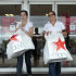 FILE - In this file photo taken Sept, 29, 2011, Elsy Santiago, left, and her sister Betsy shop at a store in Hialeah, Fla.  Consumers boosted their spending in September at three times the pace of the previous month but their incomes barely budged. They financed the gains from savings, sending the savings rate to the lowest level since the start of the Great Recession. (AP Photo/Alan Diaz, File)
