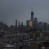 One World Trade Center and large portions of lower Manhattan and Hoboken, N.J., are seen without power from Jersey City, N.J., Tuesday, Oct. 30, 2012, the morning after a powerful storm that started out as Hurricane Sandy made landfall on the East Coast. New York City awakened Tuesday to a flooded subway system, shuttered financial markets and hundreds of thousands of people without power a day after a wall of seawater and high winds slammed into the city, destroying buildings and flooding tunnels. (AP Photo/Charles Sykes)