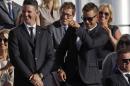 Europe's Justin Rose and Europe's Henrik Stenson react after it was announced they were playing United States' Jordan Spieth and United States' Patrick Reed in Friday's first round during the opening ceremony for the Ryder Cup golf tournament Thursday, Sept. 29, 2016, at Hazeltine National Golf Club in Chaska, Minn. (AP Photo/David J. Phillip)