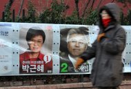 This file photo shows posters of South Korea's presidential candidates, on the day of country's presidential election, in Seoul, on December 19, 2012. North Korea reported on Park Geun-Hye's victory in the election a day late, with no mention of her name, and no reference to the historic nature of her win