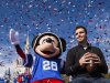 In this photo provided by Disney, Super Bowl MVP Joe Flacco rides with the character Mickey Mouse in a parade through the Magic Kingdom at Walt Disney World Resort on Monday, Feb. 4, 2013, in Lake Buena Vista, Fla. Baltimore Ravens quarterback Joe Flacco led his team to a 34-31 victory over the San Francisco 49ers at the NFL Super Bowl XLVII football game on Sunday in New Orleans. (AP Photo/Disney, Matt Stroshane)