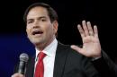 In this Aug. 22, 2015 file photo, Republican presidential candidate, Sen. Marco Rubio, R-Fla., speaks in Columbus. To some Republican presidential candidates, it's better to be with the popular pope than against him. (AP Photo/Paul Vernon, File)