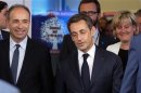 Former French President Sarkozy French UMP political party head Cope and party member Morano leave the UMP political party headquarters in Paris
