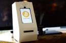 A bitcoin ATM machine is shown at a restaurant in San Diego