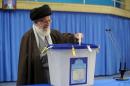 Iran's Supreme Leader Ayatollah Ali Khamenei casts his vote during elections for the parliament and Assembly of Experts, in Tehran