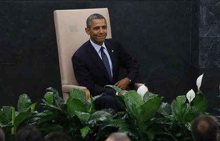 U.S. President Obama takes his seat after arriving to address the 68th United Nations General Assembly in New York