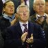 Manchester United's manager Alex Ferguson applauds from the stand before Everton face Newcastle United in their English Premier League soccer match in Liverpool