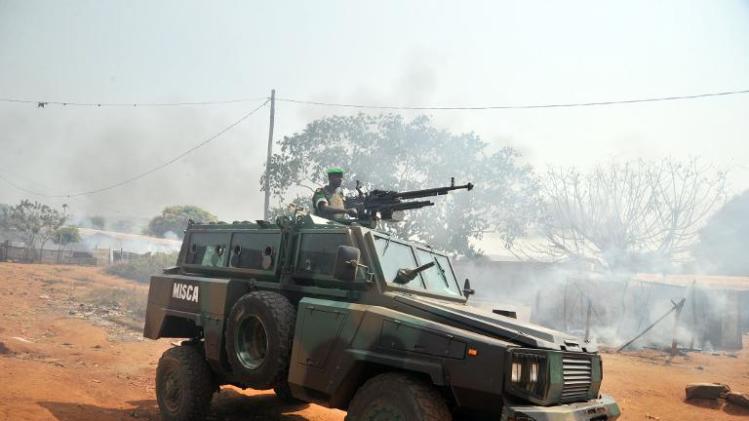 Rwandan soldiers from the International Support Mission to the Central African Republic patrol in the Pk 13 district, north of Bangui on January 22, 2014