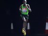 Kenya's Emmanuel Mutai takes the lead as he runs during the last few miles of the men's 2011 London Marathon