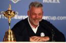 European Ryder Cup captain Darren Clarke smiles during a press conference at Wentworth Golf Club, Virginia Waters, England Tuesday Aug. 30, 2016. Lee Westwood, Martin Kaymer and Thomas Pieters will fill out the European team as Darren Clarke's captain's picks for the Ryder Cup against the United States at Hazeltine from Sept. 30-Oct. 2. Clarke announced his choices at the European Tour's headquarters at Wentworth on Tuesday. (Andrew Matthews/PA via AP)