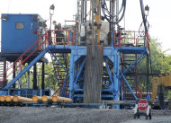 <p> FILE - In a Monday, June 25, 2012 photo, a crew works on a drilling rig at a well site for shale based natural gas in Zelienople, Pa. .S. consumer prices rose slightly in May 2013, as higher energy costs were partly offset by cheaper food. The small increase underscores that inflation is mild. (AP Photo/Keith Srakocic, File)