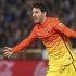Barcelona's Lionel Messi celebrates his goal against Granada during their Spanish first division soccer match at Los Carmenes stadium in Granada