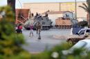 Lebanese army soldiers guard a street in the northern port city of Tripoli on August 4, 2014